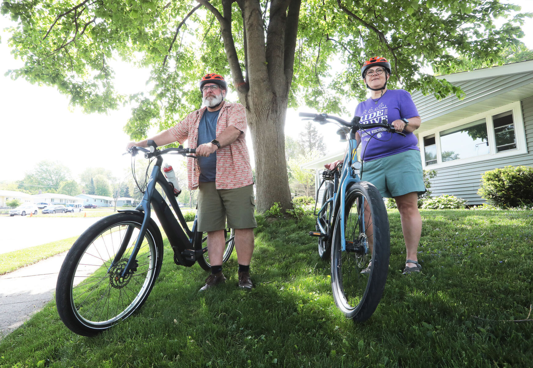Wendy and Jeff Murkve standing with bikes